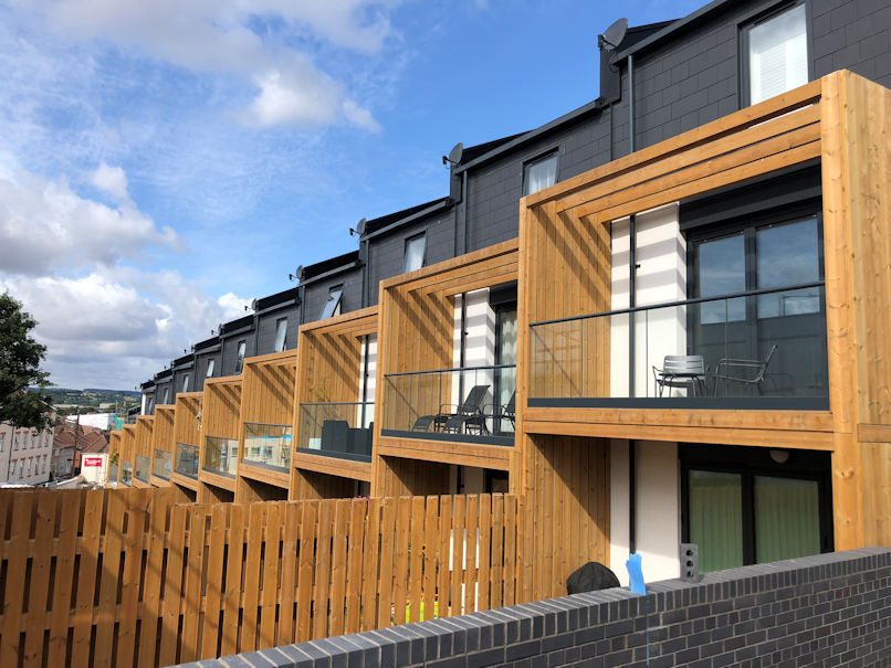A terrace of modern Just Lets properties with timber balconies, Luckwell Road, Bedminster
